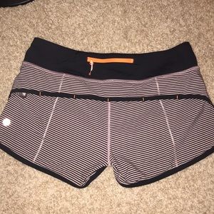 Black and light pink striped lulu lemon shorts